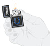 NFL Indianapolis Colts Windproof Lighter lit in hand.