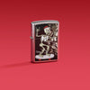 Lifestyle image of Zippo Skateboard Street Chrome Windproof Lighter on a red background.