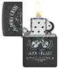 Zippo Johnny Cash Black Crackle Windproof Lighter with its lid open and lit.