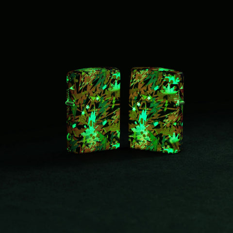 Lifestyle image of two Zippo Retro Design Glow in the Dark Green Matte Windproof Lighters glowing in the dark.