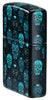 Angled shot of Zippo Sugar Skulls Design Glow in the Dark Matte Windproof Lighter showing the front and right side of the lighter.
