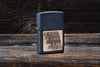 Lifestyle image of the Black Crackle® Brass Zippo Logo Emblem Lighter 