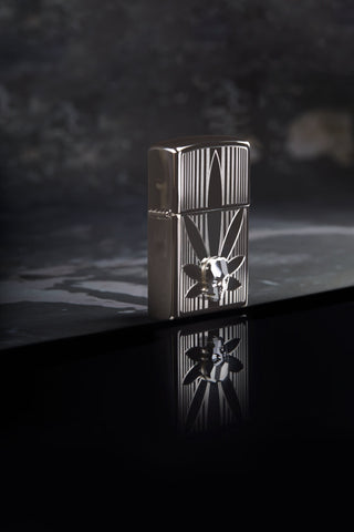 Lifestyle image of Zippo Cannabis Design Black Ice Windproof Lighter.