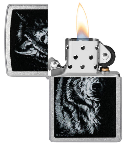 Zippo Lindsay Kivi Shadow Wolf Street Chrome Windproof Lighter with its lid open and lit.