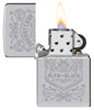 Zippo Johnny Cash High Polish Chrome Windproof Lighter with its lid open and lit.