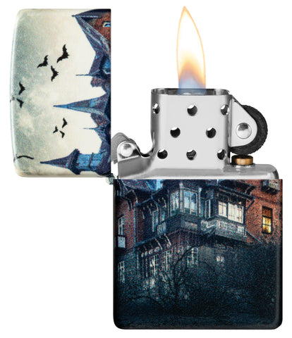 Zippo Horror House Glow in the Dark Matte Windproof Lighter with its lid open and lit.