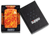 Zippo Fire Design 540 Tumbled Brass Windproof Lighter in its packaging.