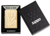 Zippo Leaf Feather Design High Polish Brass Windproof Lighter in its packaging.