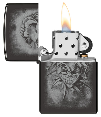 Zippo Clown High Polish Black Windproof Lighter with its lid open and lit.