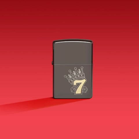 Lifestyle image of Zippo Lucky 7 Black Ice Windproof Lighter on a red background.
