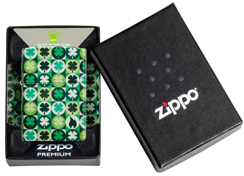 Zippo Clover Design Glow in the Dark Green Matte Windproof Lighter in its packaging.