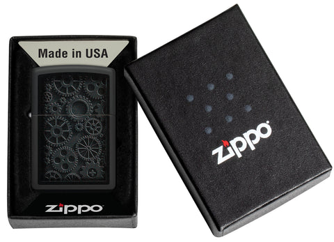 Zippo Steampunk Design Black Matte Windproof Lighter in its packaging.
