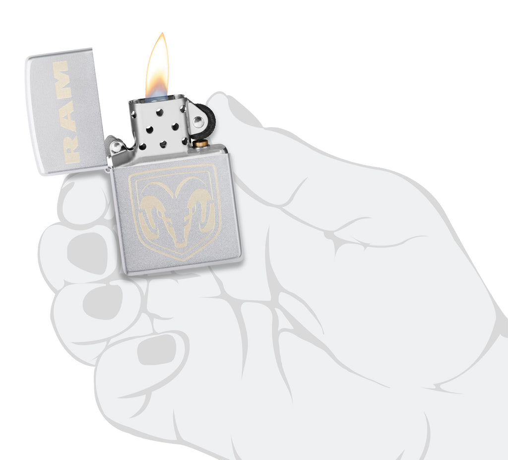 Zippo RAM Satin Chrome Windproof Lighter lit in hand.