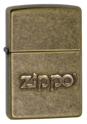 Front shot of Zippo Stamp Antique Brass Lighter standing at a 3/4 angle.