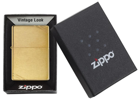 Brushed Brass Vintage with Slashes Windproof Lighter in its packaging