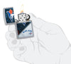 MLB® Toronto Blue Jays™ Street Chrome™ Windproof Lighter lit in hand.