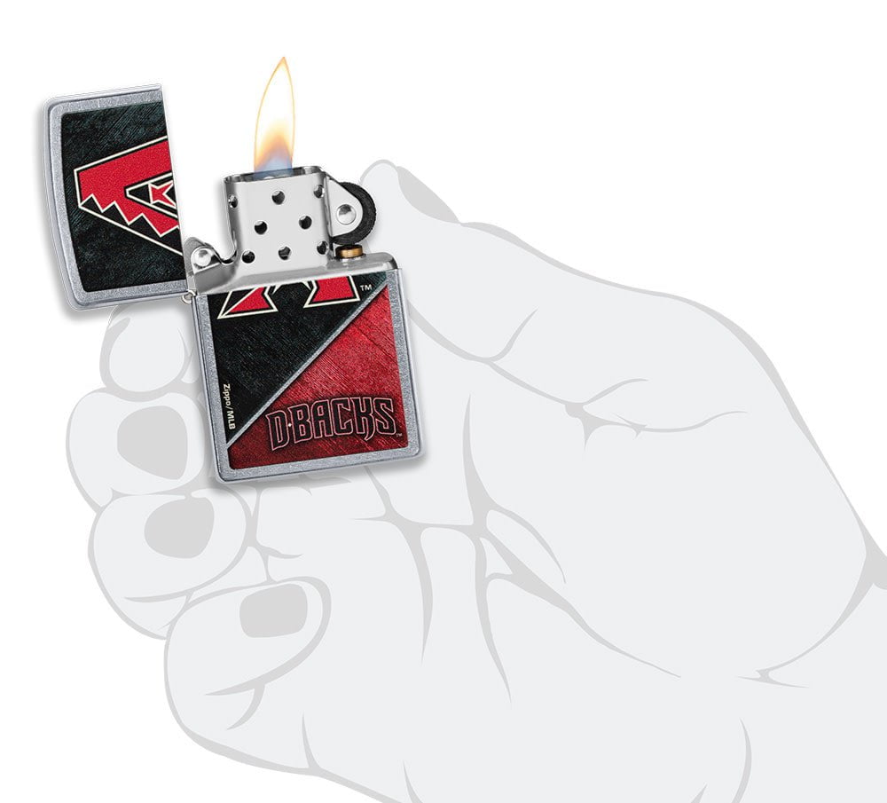 MLB™ Arizona Diamondbacks™ Street Chrome™ Windproof Lighter lit in hand.