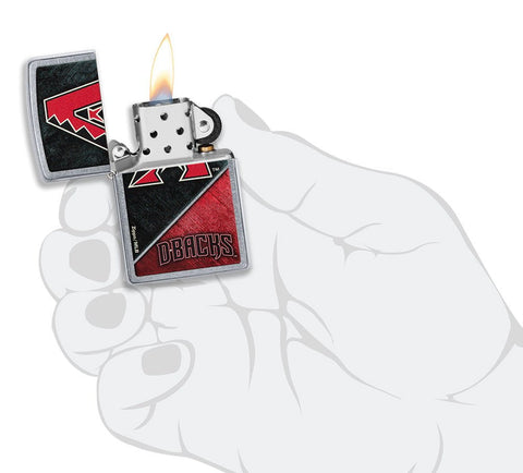 MLB™ Arizona Diamondbacks™ Street Chrome™ Windproof Lighter lit in hand.