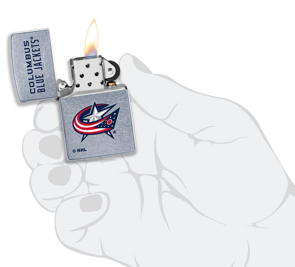 NHL Columbus Blue Jackets Street Chrome™ Windproof Lighter lit in hand