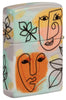 Abstract Faces Design 540 Color Windproof Lighter with its lid open and lit.