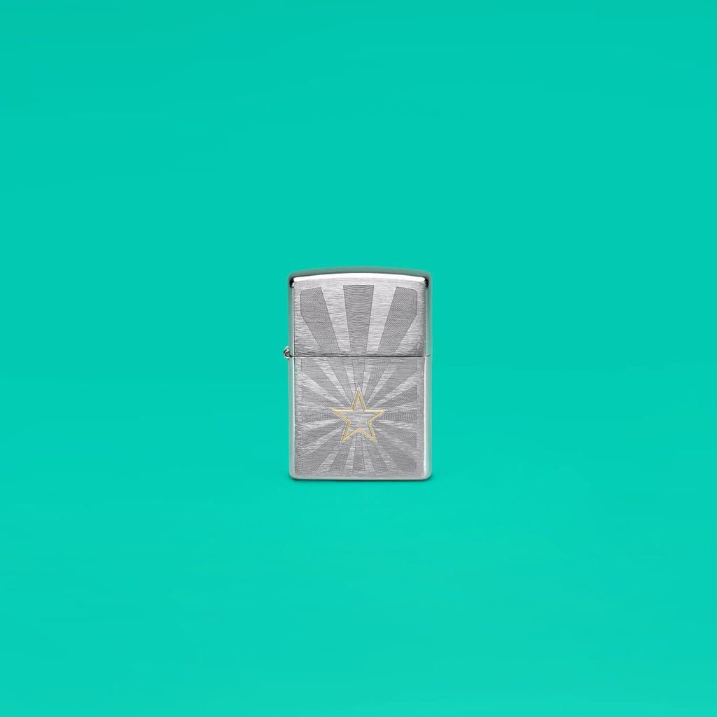 Lifestyle image of Zippo Star Design Brushed Chrome Windproof Lighter standing in a teal scene.