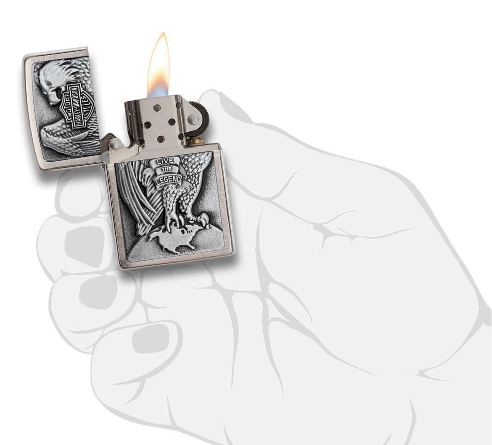Front view of the Harley-Davidson Majestic Eagle Lighter in hand, open and lit