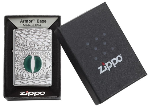 Front view of the Green Dragon Eye, Deep Carve, Epoxy Inlay, High Polish Chrome Lighter in one box packaging