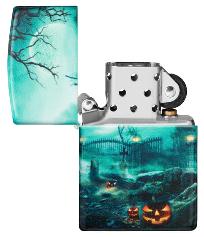 Zippo Graveyard Design 540 Color Windproof Lighter with its lid open and unlit.