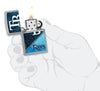 MLB® Tampa Bay Rays™ Street Chrome™ Windproof Lighter lit in hand.