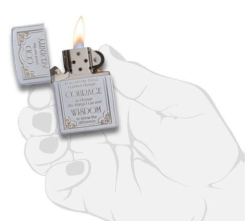 Satin Chrome Serenity Prayer Windproof Lighter lit in hand.