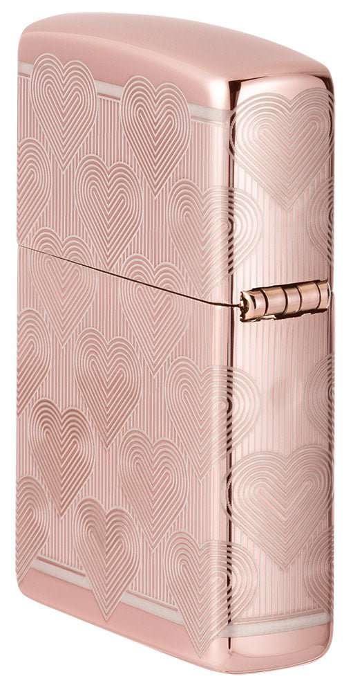 Angled shot of Heart Design High Polish Rose Gold Windproof Lighter, showing the back and hinge side of the lighter.
