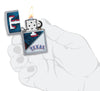 MLB® Texas Rangers™ Street Chrome™ Windproof Lighter lit in hand.