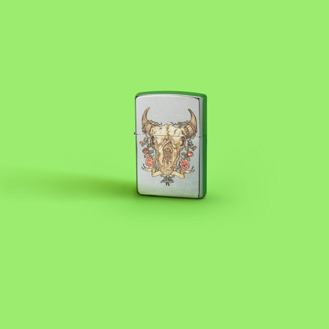 Glamour shot of Zippo Rick Rietveld Floral Bull Skull Street Chrome Windproof Lighter standing in a green scene.