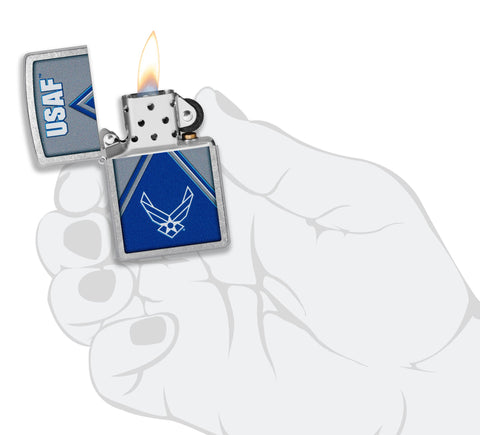 Zippo U.S. Air Force Design Street Chrome Windproof Lighter lit in hand.
