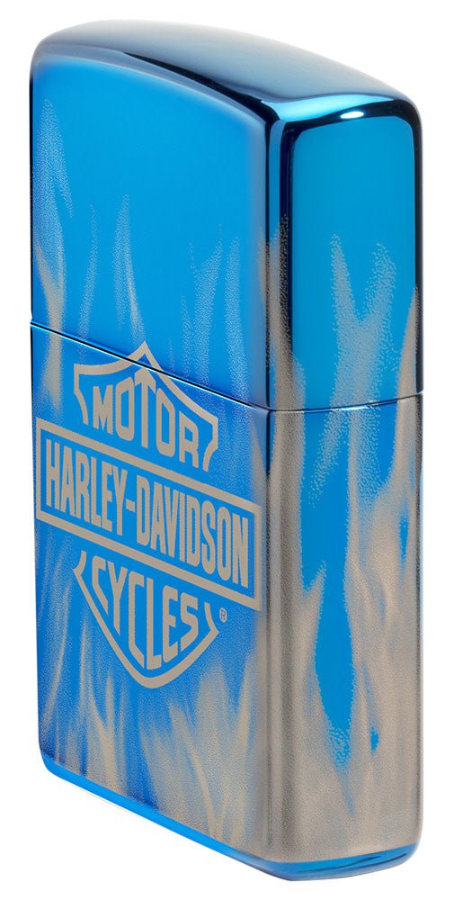 Harley-Davidson 360° Flames High Polish Blue Windproof Lighter standing at an angle, showing the front and right side of the lighter.