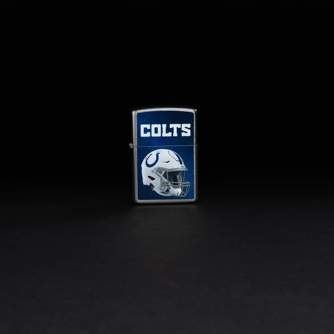 Lifestyle image of NFL Indianapolis Colts Helmet Street Chrome Windproof Lighter standing in a black background.