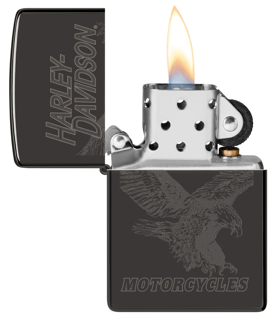 Zippo Harley-Davidson Laser Fancy Fill High Polish Black Windproof Lighter with its lid open and lit.