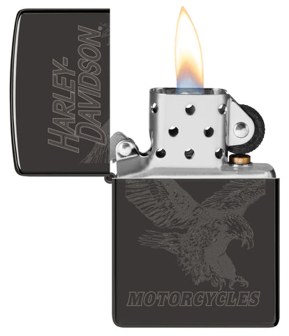 Zippo Harley-Davidson Laser Fancy Fill High Polish Black Windproof Lighter with its lid open and lit.