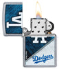 MLB® Los Angeles Dodgers™ Street Chrome™ Windproof Lighter with its lid open and lit.