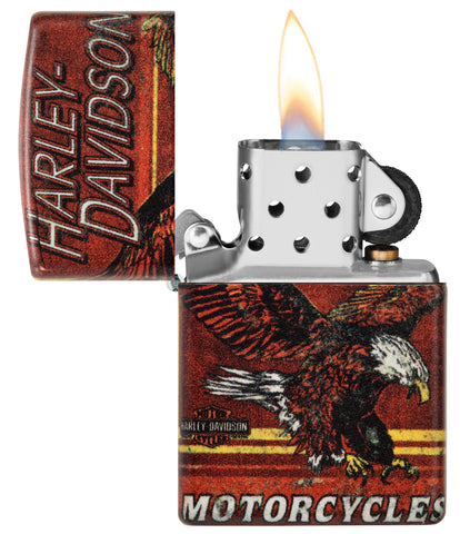 Zippo Harley-Davidson Eagle 540 Color Windproof Lighter with its lid open and lit.