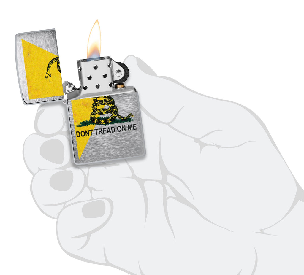 Dont Tread On Me Flag Design Street Chrome™ Windproof Lighter lit in hand.