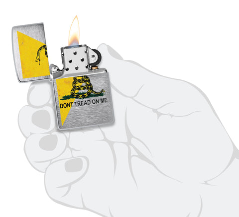 Dont Tread On Me Flag Design Street Chrome™ Windproof Lighter lit in hand.