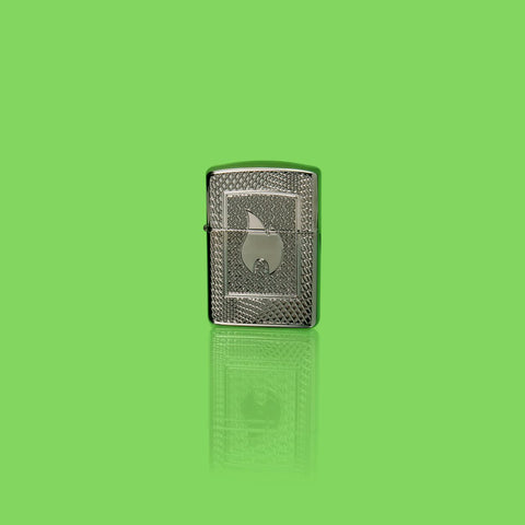 Glamour shot of Zippo Flame Pattern Design Armor Black Ice Windproof Lighter standing in a green scene.