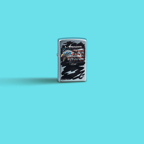 Glamour shot of Zippo Buckwear Design Eagle Flag Street Chrome Windproof Lighter standing in a blue scene.