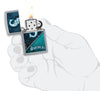 MLB® Seattle Mariners™ Street Chrome™ Windproof Lighter lit in hand.
