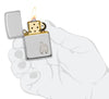 Armor® Sterling Silver Flame Emblem Windproof Lighter lit in hand