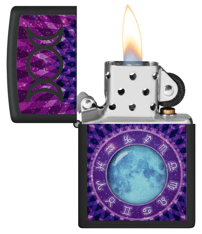 Glowing Zodiac Design Black Light Black Matte Windproof Lighter with its lid open and lit.
