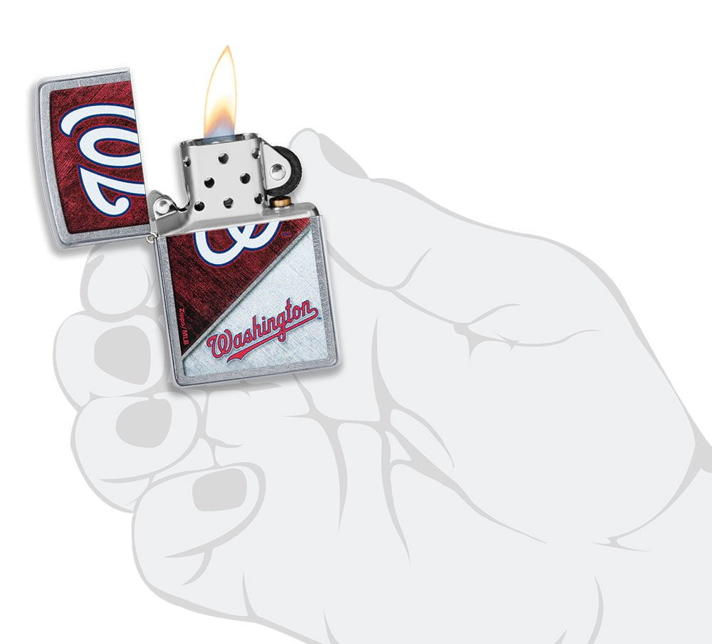 MLB™ Washington Nationals™ Street Chrome™ Windproof Lighter lit in hand.