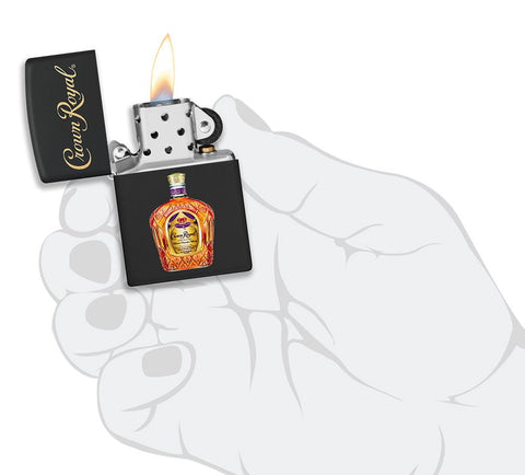 Crown Royal® Logo Black Matte Windproof Lighter lit in hand.
