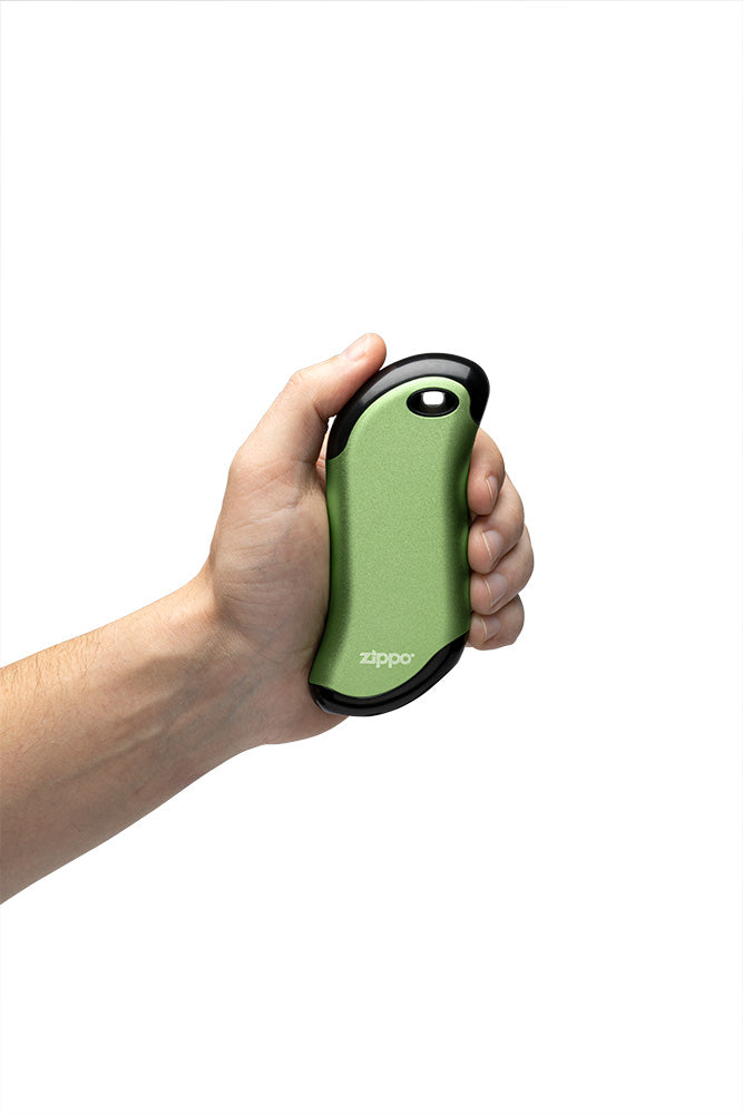 Green HeatBank 9s Rechargeable Hand Warmer in hand.